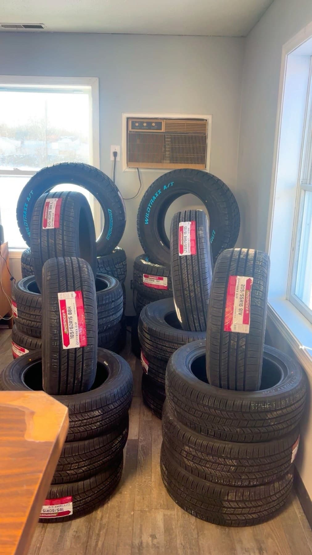 New tires with labels stacked in the front office